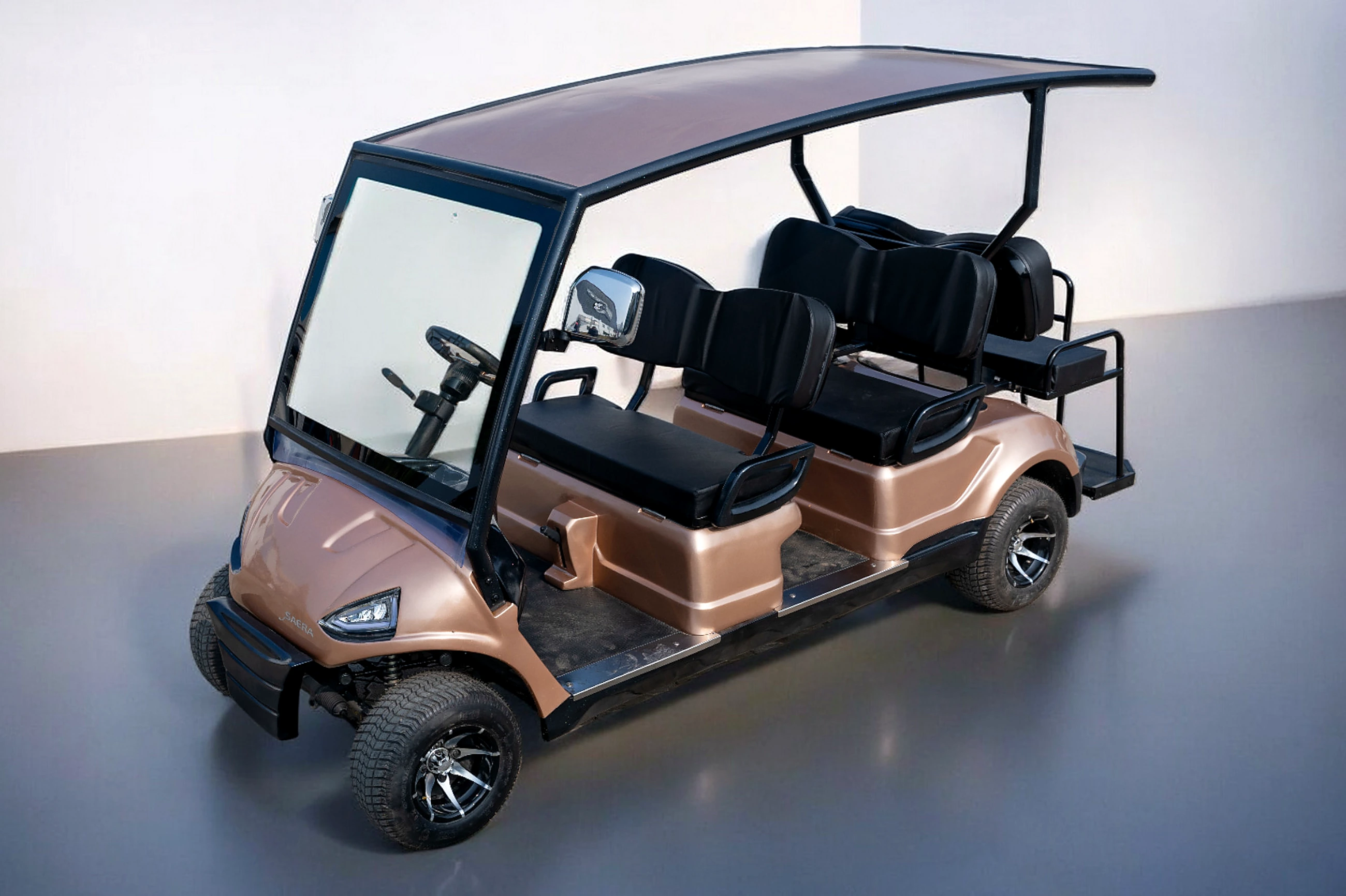 SAERA electric cart in gold, parked at an estate entrance